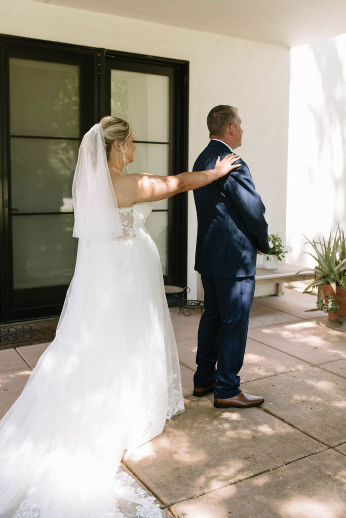 bride and her dad during their first look