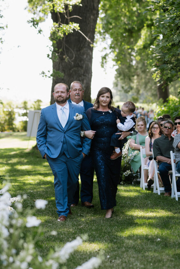 groom walking down the aisle