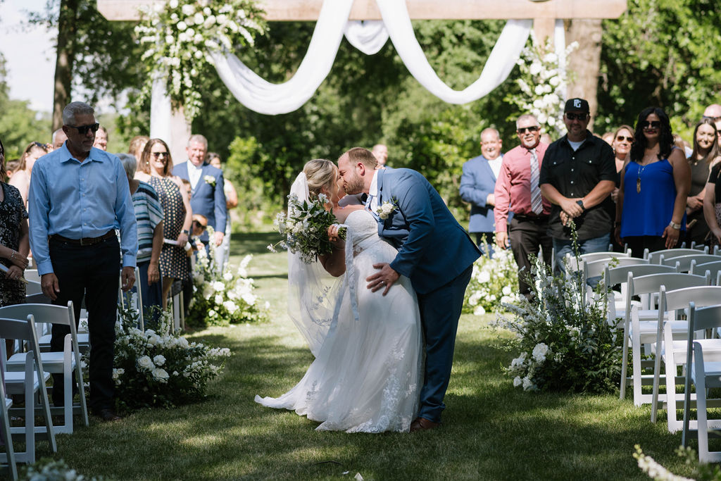 bride and groom heading to their wedding reception