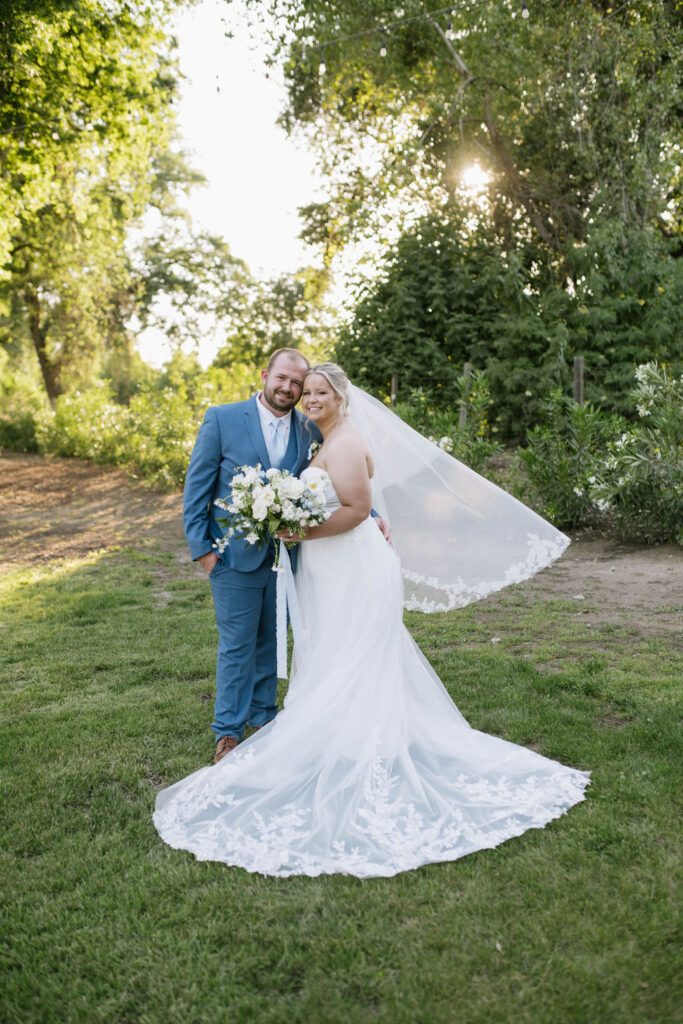 bride and groom hugging during their photoshoot