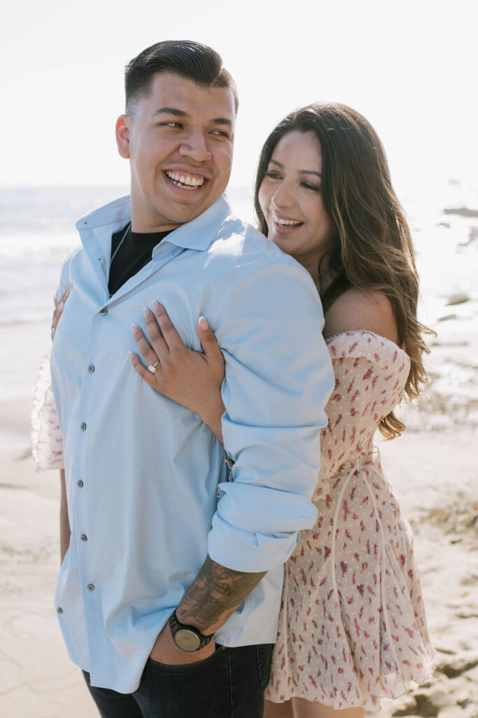 couple hugging after their proposal photoshoot 