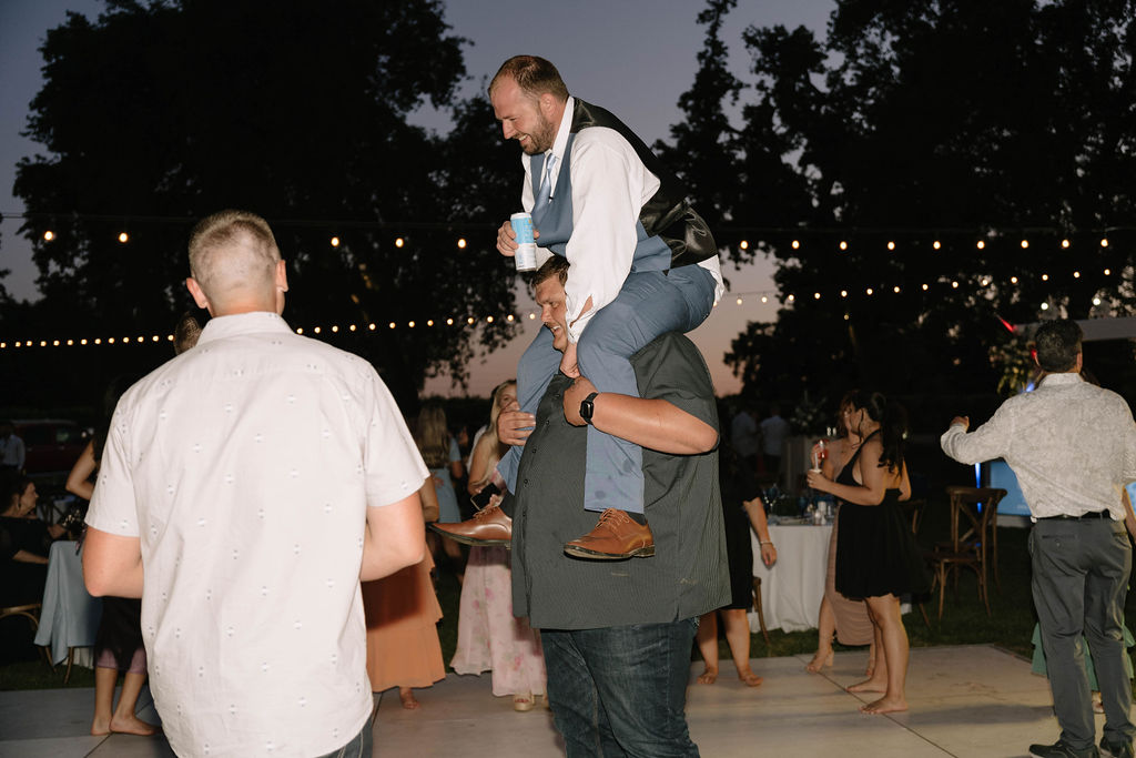 groom at the wedding reception