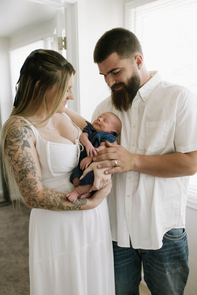 parents at the intimate in-home newborn session