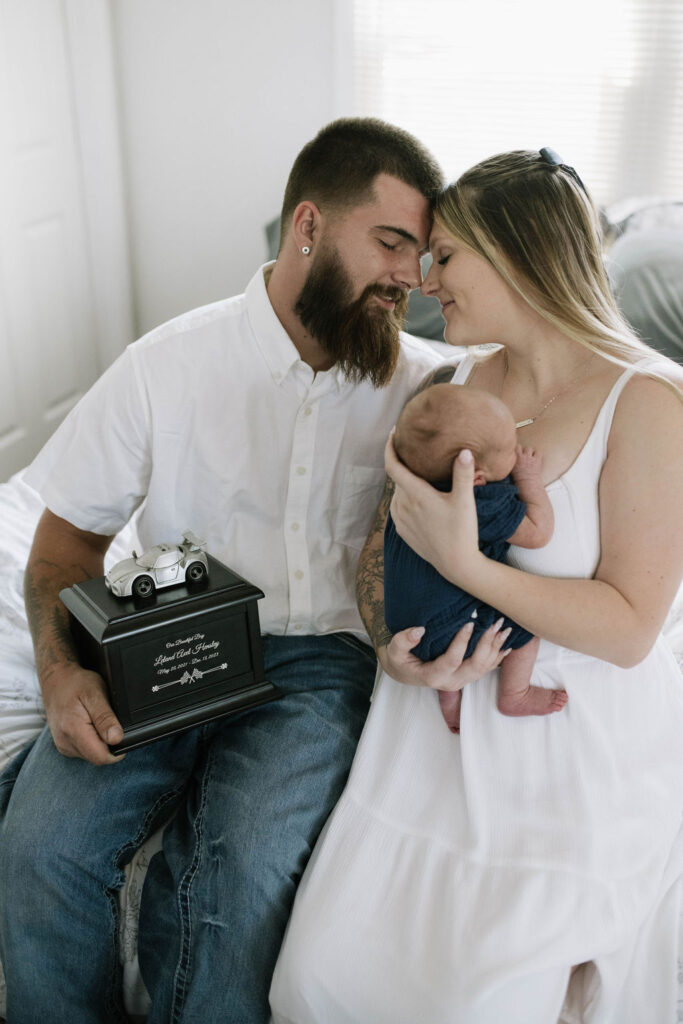 couple hugging during their Intimate In-Home Newborn Session 