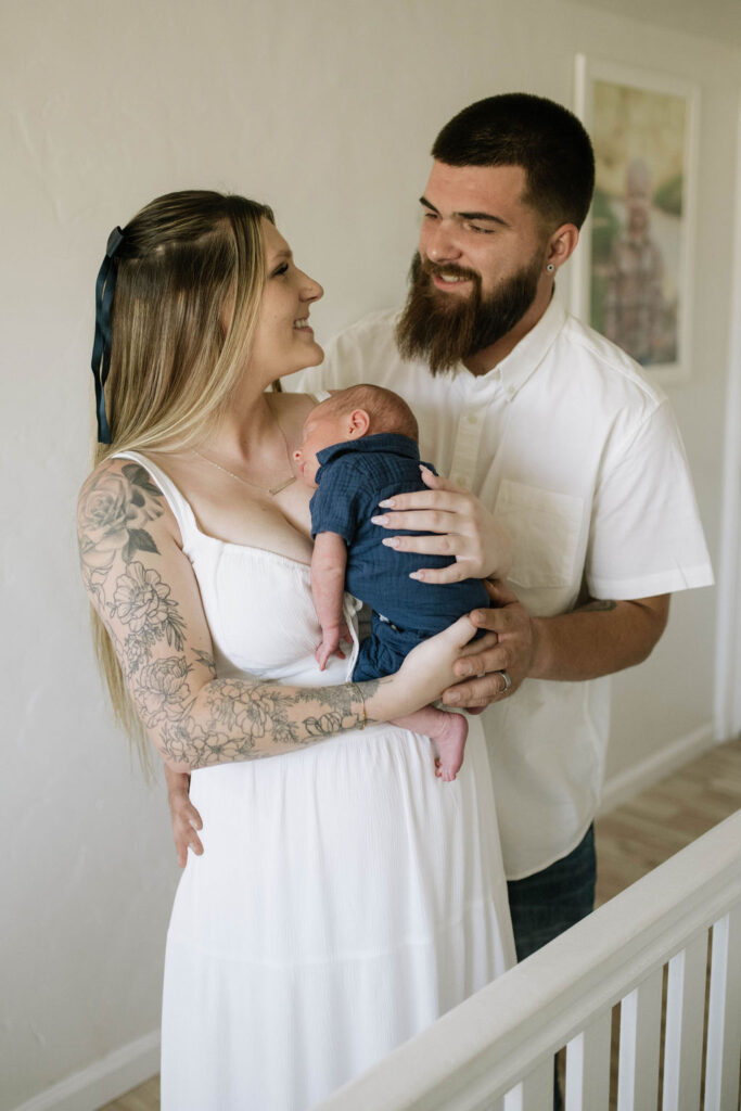 parents smiling and looking at each other 