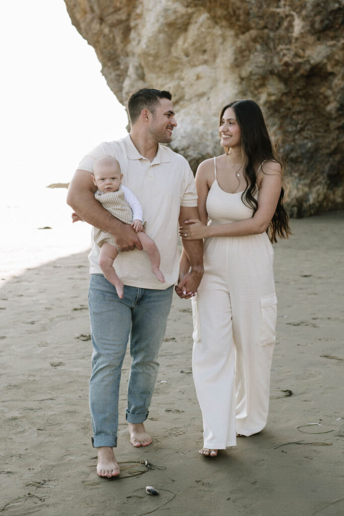 couple walking around the beach 