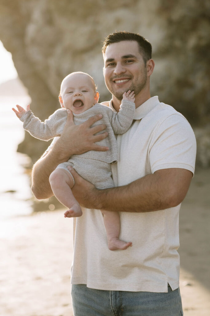 dad holding her baby boy